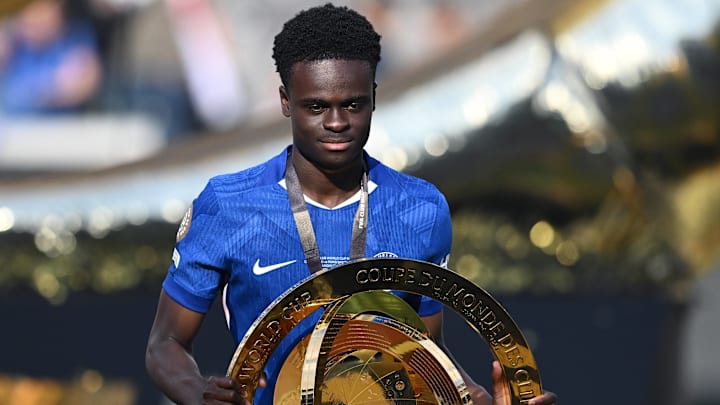 Tyrique George with the FIFA Club World Cup trophy.