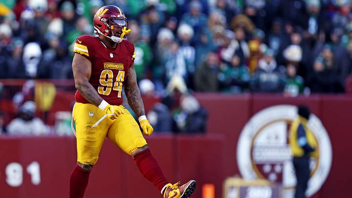 Dec 22, 2024; Landover, Maryland, USA; Washington Commanders defensive tackle Daron Payne (94) celebrates after a play during the third quarter against the Philadelphia Eagles at Northwest Stadium. Mandatory Credit: Peter Casey-Imagn Images