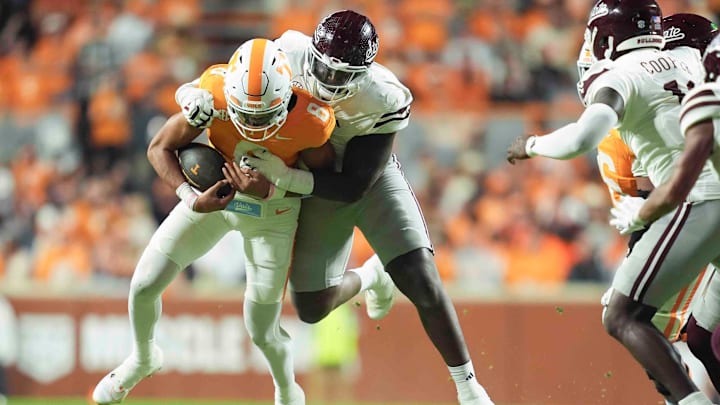 Nov 9, 2024; Knoxville, Tennessee Volunteers, USA; Tennessee Volunteers quarterback Nico Iamaleava (8) is sacked by the Mississippi State Bulldogs during the first half at Neyland Stadium. Mandatory Credit: Caitie McMekin/USA TODAY Network via Imagn Images