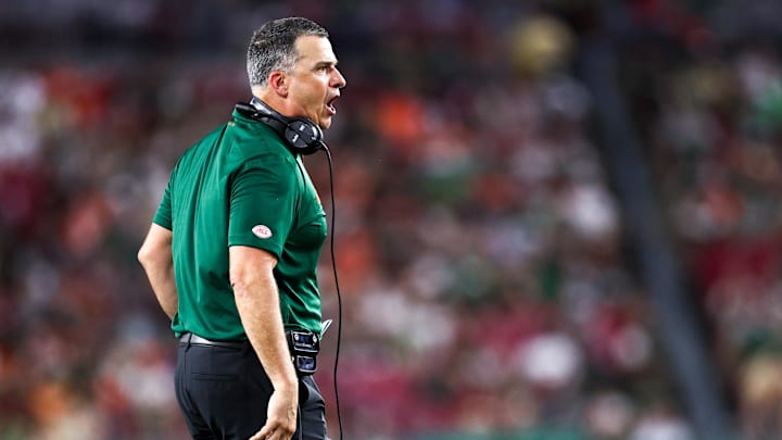 Sep 21, 2024; Tampa, Florida, USA; Miami Hurricanes head coach Mario Cristobal reacts to a play against the South Florida Bulls in the fourth quarter at Raymond James Stadium. Mandatory Credit: Nathan Ray Seebeck-Imagn Images
