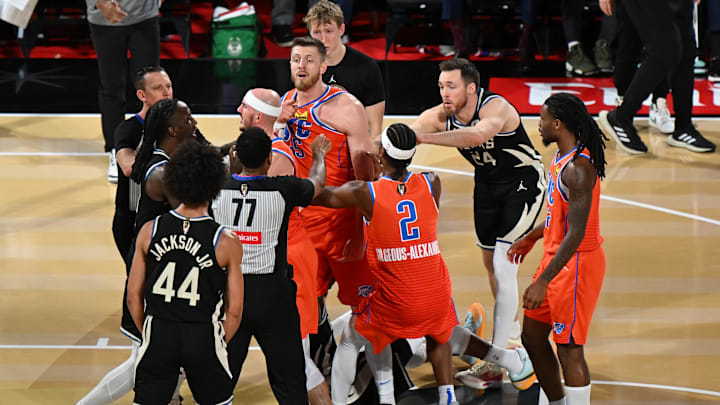 Dec 17, 2024; Las Vegas, Nevada, USA; Oklahoma City Thunder center Isaiah Hartenstein (55) and Milwaukee Bucks forward Taurean Prince (12) get into a scuffle during the 2nd quarter of the Emirates NBA Cup championship game at T-Mobile Arena. Mandatory Credit: Candice Ward-Imagn Images