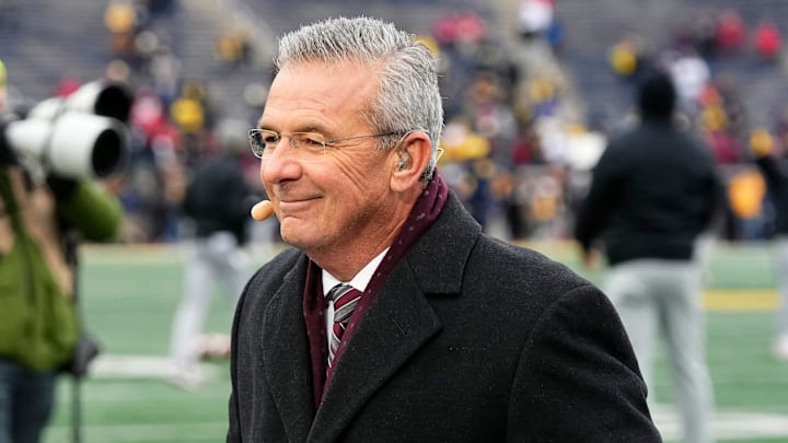 Former Ohio State Buckeyes head coach Urban Meyer broadcasts on Fox's Big Noon Kickoff prior to the NCAA football game between the Buckeyes and the Michigan Wolverines at Michigan Stadium in Ann Arbor, Mich. on Nov. 29, 2025.