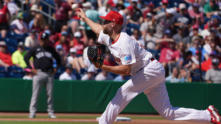 Feb 27, 2025; Clearwater, Florida, USA; Philadelphia Phillies pitcher Zack Wheeler (45) throws a pitch during the first inning against the New York Yankees at BayCare Ballpark. 