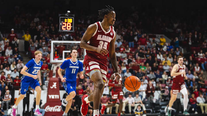 Dec 14, 2024; Tuscaloosa, Alabama, USA; Alabama Crimson Tide forward Derrion Reid (35) drives the ball against the Creighton Bluejays during the second half at Coleman Coliseum. Mandatory Credit: Will McLelland-Imagn Images Dec 14, 2024; Tuscaloosa, Alabama, USA; Alabama Crimson Tide forward Derrion Reid (35) drives the ball against the Creighton Bluejays during the second half at Coleman Coliseum. Mandatory Credit: Will McLelland-Imagn Images