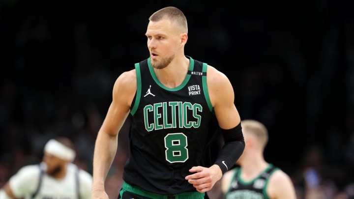Jun 9, 2024; Boston, Massachusetts, USA; Boston Celtics center Kristaps Porzingis (8) reacts after a play against the Dallas Mavericks during the first quarter in game two of the 2024 NBA Finals at TD Garden. Mandatory Credit: Peter Casey-USA TODAY Sports