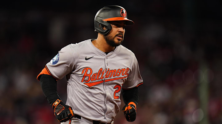 Sep 9, 2024; Boston, Massachusetts, USA; Baltimore Orioles right fielder Anthony Santander (25) hits a home run against the Boston Red Sox in the seventh inning at Fenway Park.