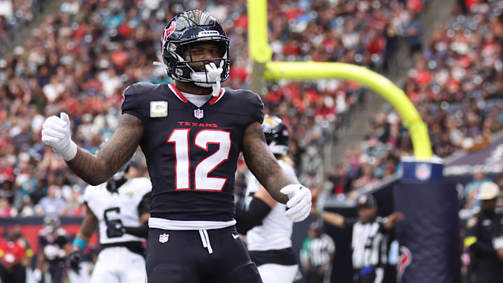 Nov 9, 2025; Houston, Texas, USA; Houston Texans wide receiver Nico Collins (12) reacts after an incomplete pass against the Jacksonville Jaguars during the first half at NRG Stadium. Mandatory Credit: Troy Taormina-Imagn Images