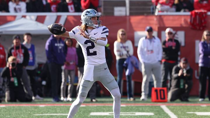 Nov 22, 2025; Salt Lake City, Utah, USA; Kansas State Wildcats quarterback Avery Johnson (2) throws the ball against the Utah Utes during the first quarter at Rice-Eccles Stadium. Mandatory Credit: Rob Gray-Imagn Images Nov 22, 2025; Salt Lake City, Utah, USA; Kansas State Wildcats quarterback Avery Johnson (2) throws the ball against the Utah Utes during the first quarter at Rice-Eccles Stadium. Mandatory Credit: Rob Gray-Imagn Images