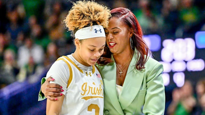 Feb 17, 2025; South Bend, Indiana, USA; Notre Dame Fighting Irish head coach Niele Ivey talks to guard Hannah Hidalgo (3) in the second half against the Duke Blue Devils at the Purcell Pavilion. Feb 17, 2025; South Bend, Indiana, USA; Notre Dame Fighting Irish head coach Niele Ivey talks to guard Hannah Hidalgo (3) in the second half against the Duke Blue Devils at the Purcell Pavilion.