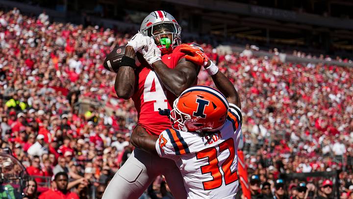 Ohio State wide receiver Jeremiah Smith catches a touchdown over Illinois defensive back Tywan Cox. Smith is The Dash’s September Heisman. Ohio State wide receiver Jeremiah Smith catches a touchdown over Illinois defensive back Tywan Cox. Smith is The Dash’s September Heisman.