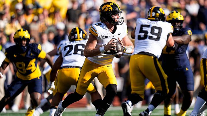 Iowa quarterback Hank Brown (9) looks to pass against Michigan during the first half at Michigan Stadium in Ann Arbor on Saturday, Sept. 26, 2026. Iowa quarterback Hank Brown (9) looks to pass against Michigan during the first half at Michigan Stadium in Ann Arbor on Saturday, Sept. 26, 2026.