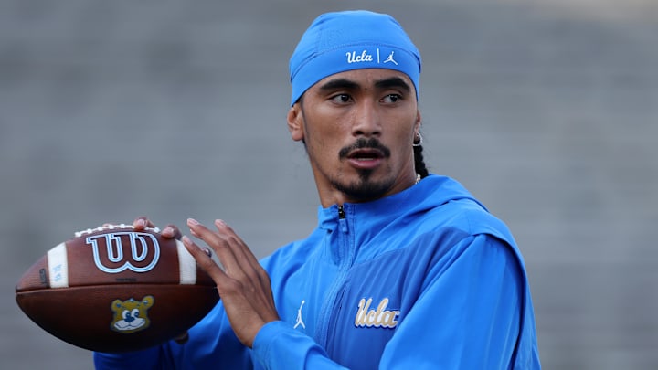 Sep 12, 2025; Pasadena, California, USA;  UCLA Bruins quarterback Nico Iamaleava (9) warms up before the game against the New Mexico Lobos at Rose Bowl. Mandatory Credit: Kiyoshi Mio-Imagn Images