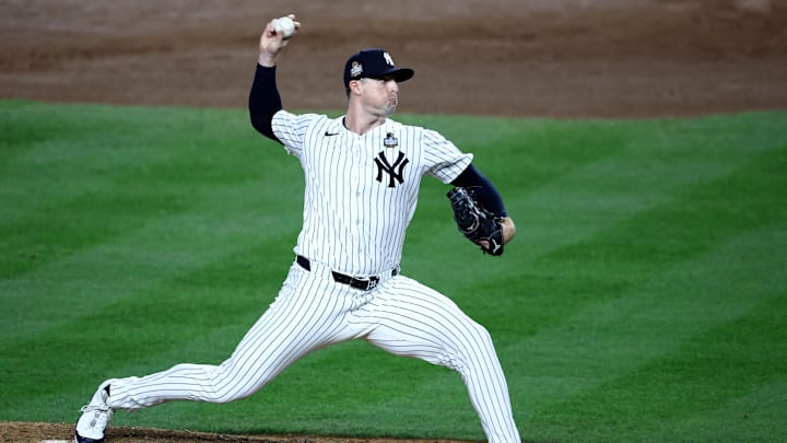 Oct 30, 2024; New York, New York, USA; New York Yankees pitcher Clay Holmes (35) throws during the seventh inning against the Los Angeles Dodgers in game five of the 2024 MLB World Series at Yankee Stadium. Mandatory Credit: Wendell Cruz-Imagn Images