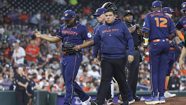 May 1, 2023; Houston, Texas, USA; Houston Astros starting pitcher Luis Garcia (77) walks off the mound after an apparent injury during the first inning against the San Francisco Giants at Minute Maid Park. May 1, 2023; Houston, Texas, USA; Houston Astros starting pitcher Luis Garcia (77) walks off the mound after an apparent injury during the first inning against the San Francisco Giants at Minute Maid Park.
