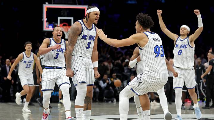 Jan 7, 2026; Brooklyn, New York, USA; Orlando Magic forward Paolo Banchero (5) celebrates with teammates after his overtime game-winning three point shot against the Brooklyn Nets at Barclays Center. Mandatory Credit: Brad Penner-Imagn Images Jan 7, 2026; Brooklyn, New York, USA; Orlando Magic forward Paolo Banchero (5) celebrates with teammates after his overtime game-winning three point shot against the Brooklyn Nets at Barclays Center. Mandatory Credit: Brad Penner-Imagn Images