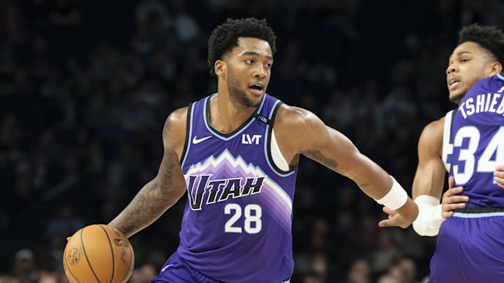 Mar 18, 2026; Minneapolis, Minnesota, USA; Utah Jazz forward Brice Sensabaugh (28) dribbles the ball against the Minnesota Timberwolves in the second half at Target Center. Mandatory Credit: Jesse Johnson-Imagn Images