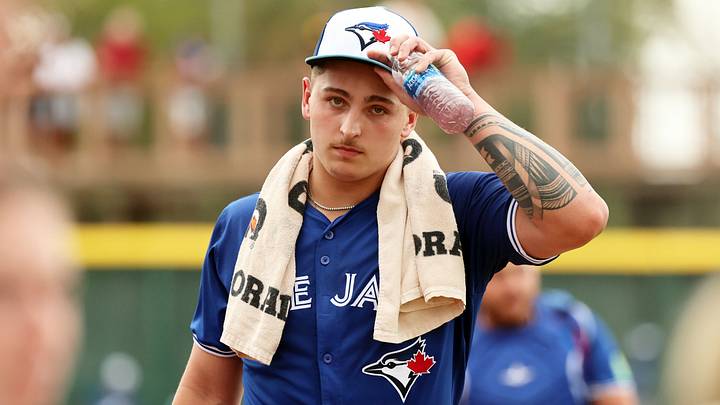 Mar 21, 2024; Bradenton, Florida, USA; Toronto Blue Jays pitcher Ricky Tiedemann (70) walks to the dugout before the game against the Pittsburgh Pirates at LECOM Park. Mandatory Credit: Kim Klement Neitzel-USA TODAY Sports Mar 21, 2024; Bradenton, Florida, USA; Toronto Blue Jays pitcher Ricky Tiedemann (70) walks to the dugout before the game against the Pittsburgh Pirates at LECOM Park. Mandatory Credit: Kim Klement Neitzel-USA TODAY Sports