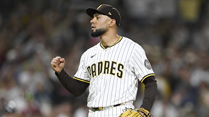 Sep 27, 2025; San Diego, California, USA; San Diego Padres relief pitcher Robert Suarez (75) pumps his fist after the Padres beat the Arizona Diamondbacks at Petco Park. Mandatory Credit: Denis Poroy-Imagn Images Sep 27, 2025; San Diego, California, USA; San Diego Padres relief pitcher Robert Suarez (75) pumps his fist after the Padres beat the Arizona Diamondbacks at Petco Park. Mandatory Credit: Denis Poroy-Imagn Images