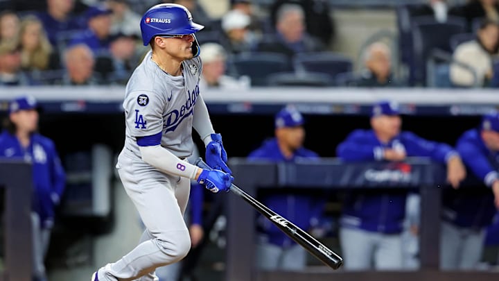 Oct 28, 2024; New York, New York, USA; Los Angeles Dodgers third baseman Enrique Hernandez (8) hits a an RBI single during the sixth inning against the New York Yankees in game three of the 2024 MLB World Series at Yankee Stadium. Mandatory Credit: Brad Penner-Imagn Images