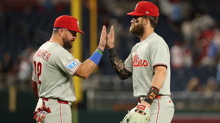 Sep 16, 2026; Washington, District of Columbia, USA; Philadelphia Phillies designated hitter Kyle Schwarber (12) celebrates with Phillies first baseman Bryce Harper (3) after their game against the Washington Nationals at Nationals Park. Mandatory Credit: Geoff Burke-Imagn Images Sep 16, 2026; Washington, District of Columbia, USA; Philadelphia Phillies designated hitter Kyle Schwarber (12) celebrates with Phillies first baseman Bryce Harper (3) after their game against the Washington Nationals at Nationals Park. Mandatory Credit: Geoff Burke-Imagn Images