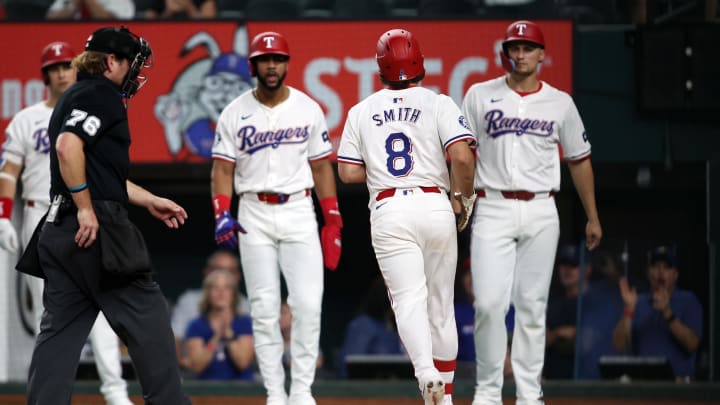 Jun 18, 2024; Arlington, Texas, USA; Texas Rangers third base Josh Smith (8) rounds the bases after hitting a three run home run against the New York Mets in the fifth inning at Globe Life Field. Mandatory Credit: Tim Heitman-USA TODAY Sports