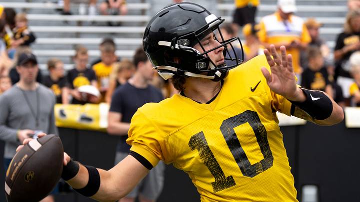 Iowa quarterback Jeremy Hecklinski (10) throws a pass Aug. 15, 2026 during the Kids Day at Kinnick open practice at Kinnick Stadium in Iowa City, Iowa. Iowa quarterback Jeremy Hecklinski (10) throws a pass Aug. 15, 2026 during the Kids Day at Kinnick open practice at Kinnick Stadium in Iowa City, Iowa.