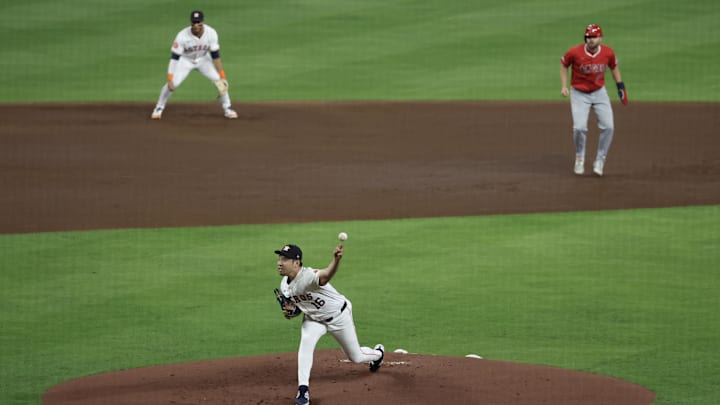 Sep 19, 2024; Houston, Texas, USA; Houston Astros starting pitcher Yusei Kikuchi (16) pitches as Los Angeles Angels first baseman Nolan Schanuel (18) leads off second base in the first inning at Minute Maid Park. Mandatory Credit: Thomas Shea-Imagn Images Sep 19, 2024; Houston, Texas, USA; Houston Astros starting pitcher Yusei Kikuchi (16) pitches as Los Angeles Angels first baseman Nolan Schanuel (18) leads off second base in the first inning at Minute Maid Park. Mandatory Credit: Thomas Shea-Imagn Images