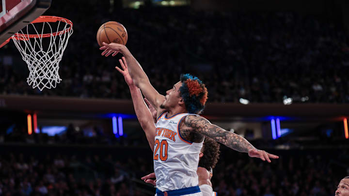 Feb 19, 2026; New York, New York, USA; New York Knicks forward Jeremy Sochan (20) blocks a shot by Detroit Pistons guard Cade Cunningham (2) during the second half at Madison Square Garden. Mandatory Credit: Vincent Carchietta-Imagn Images