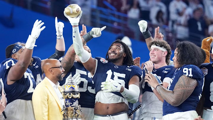 Penn State players celebrate winning the Fiesta Bowl. Penn State players celebrate winning the Fiesta Bowl.