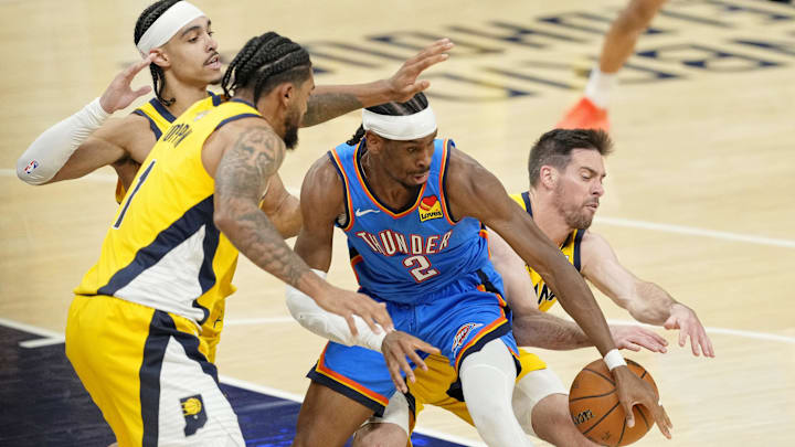 Jun 19, 2025; Indianapolis, Indiana, USA; Oklahoma City Thunder guard Shai Gilgeous-Alexander (2) loses control of the ball against Indiana Pacers forward Obi Toppin (1) and guard T.J. McConnell (right) during the first half in Game 6 of the 2025 NBA Finals at Gainbridge Fieldhouse. Mandatory Credit: Kyle Terada-Imagn Images