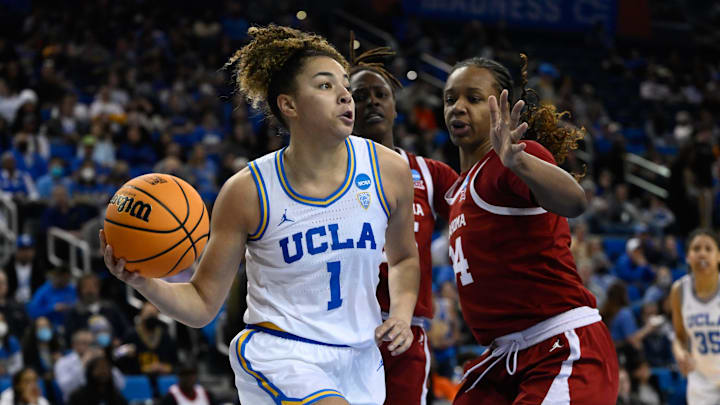 Mar 20, 2023; Los Angeles, CA, USA; UCLA Bruins guard Kiki Rice (1) defended by Oklahoma Sooners forward Madi Williams (25) and Oklahoma Sooners forward Liz Scott (34) during an NCAA Tournament Women   s 2nd Round dd game at Pauley Pavilion. Mandatory Credit: Robert Hanashiro-Imagn Images