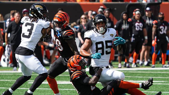 Bengals defense takes down Jaguars Brenton Strange (85) during their game against the Jaguars at Paycor Stadium on Sunday October 4, 2026. The Jaguars were up 13-3 at halftime. Bengals defense takes down Jaguars Brenton Strange (85) during their game against the Jaguars at Paycor Stadium on Sunday October 4, 2026. The Jaguars were up 13-3 at halftime.