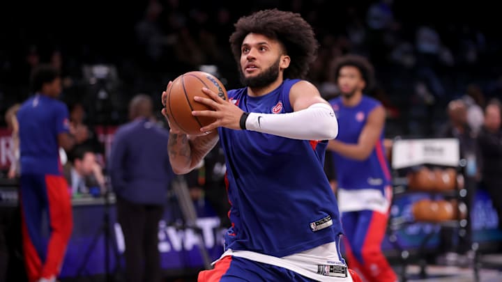 Dec 23, 2023; Brooklyn, New York, USA; Detroit Pistons forward Isaiah Livers (12) warms up before a game against the Brooklyn Nets at Barclays Center.