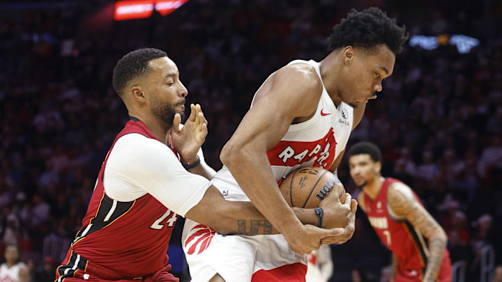 Dec 23, 2025; Miami, Florida, USA; Miami Heat guard Norman Powell (24) defends Toronto Raptors forward Scottie Barnes (4) during the first half at Kaseya Center. Mandatory Credit: Rhona Wise-Imagn Images Dec 23, 2025; Miami, Florida, USA; Miami Heat guard Norman Powell (24) defends Toronto Raptors forward Scottie Barnes (4) during the first half at Kaseya Center. Mandatory Credit: Rhona Wise-Imagn Images
