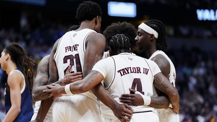 March 20, 2025; Denver, CO, USA; Texas A&M Aggies guard Wade Taylor IV (4) and teammates huddle up during the second half against the Yale Bulldogs at Ball Arena. Mandatory Credit: Ron Chenoy-Imagn Images March 20, 2025; Denver, CO, USA; Texas A&M Aggies guard Wade Taylor IV (4) and teammates huddle up during the second half against the Yale Bulldogs at Ball Arena. Mandatory Credit: Ron Chenoy-Imagn Images