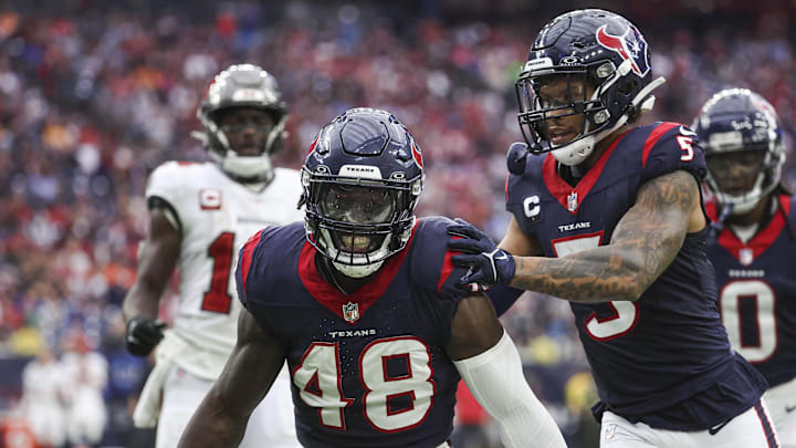 Nov 5, 2023; Houston, Texas, USA; Houston Texans linebacker Christian Harris (48) and safety Jalen Pitre (5) react after a defensive play at NRG Stadium. Mandatory Credit: Troy Taormina-Imagn Images