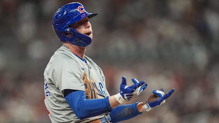 May 15, 2024; Cumberland, Georgia, USA; Chicago Cubs center fielder Pete Crow-Armstrong (52) reacts after hitting a triple against the Atlanta Braves during the eight inning at Truist Park. May 15, 2024; Cumberland, Georgia, USA; Chicago Cubs center fielder Pete Crow-Armstrong (52) reacts after hitting a triple against the Atlanta Braves during the eight inning at Truist Park.