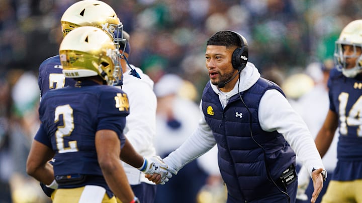 Notre Dame head coach Marcus Freeman celebrates after a touchdown in the first half of a NCAA football game against Syracuse at Notre Dame Stadium on Saturday, Nov. 22, 2025, in South Bend.
