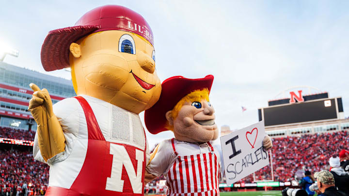 Nov 23, 2024; Lincoln, Nebraska, USA; Lil’ Red and Herbie Husker pose during the third quarter between the Nebraska Cornhuskers and the Wisconsin Badgers at Memorial Stadium. Nov 23, 2024; Lincoln, Nebraska, USA; Lil’ Red and Herbie Husker pose during the third quarter between the Nebraska Cornhuskers and the Wisconsin Badgers at Memorial Stadium.