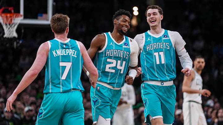 Apr 7, 2026; Boston, Massachusetts, USA; Charlotte Hornets center Ryan Kalkbrenner (11), forward Brandon Miller (24) and guard Kon Knueppel (7) react after a basket against the Boston Celtics in the second quarter at TD Garden. Mandatory Credit: David Butler II-Imagn Images