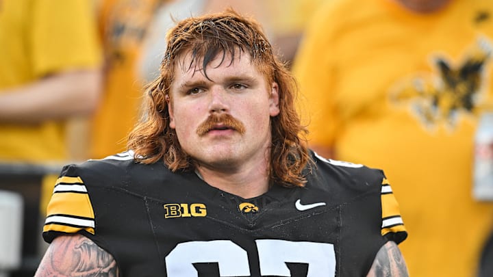 Sep 13, 2025; Iowa City, Iowa, USA; Iowa Hawkeyes offensive lineman Gennings Dunker (67) looks on before the game against the Massachusetts Minutemen at Kinnick Stadium. Mandatory Credit: Jeffrey Becker-Imagn Images