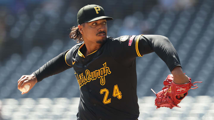 Sep 17, 2025; Pittsburgh, Pennsylvania, USA;  Pittsburgh Pirates starting pitcher Johan Oviedo (24) delivers a pitch against the Chicago Cubs during the first inning at PNC Park. Mandatory Credit: Charles LeClaire-Imagn Images