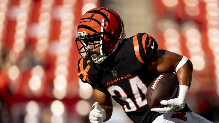 Aug 26, 2023; Landover, Maryland, USA; Cincinnati Bengals running back Jacob Saylors (34) runs with the ball before the NFL preseason week 3 game between the Cincinnati Bengals and the Washington Commanders at FedEx Field. Aug 26, 2023; Landover, Maryland, USA; Cincinnati Bengals running back Jacob Saylors (34) runs with the ball before the NFL preseason week 3 game between the Cincinnati Bengals and the Washington Commanders at FedEx Field.