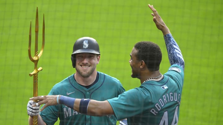 Jun 18, 2024; Cleveland, Ohio, USA; Seattle Mariners left fielder Luke Raley (20) celebrates his solo home run with center fielder Julio Rodriguez (44) in the fifth inning against the Cleveland Guardians at Progressive Field. Mandatory Credit: David Richard-USA TODAY Sports Jun 18, 2024; Cleveland, Ohio, USA; Seattle Mariners left fielder Luke Raley (20) celebrates his solo home run with center fielder Julio Rodriguez (44) in the fifth inning against the Cleveland Guardians at Progressive Field. Mandatory Credit: David Richard-USA TODAY Sports