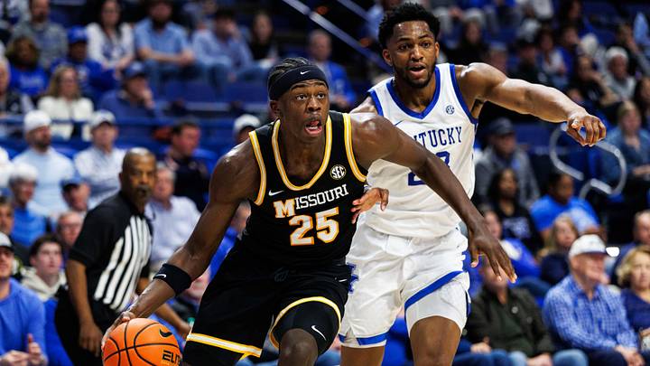 Jan 7, 2026; Lexington, Kentucky, USA; Missouri Tigers forward Mark Mitchell (25) drives to the basket around Kentucky Wildcats forward Mouhamed Dioubate (23) during the first half at Rupp Arena at Central Bank Center. Mandatory Credit: Jordan Prather-Imagn Images Jan 7, 2026; Lexington, Kentucky, USA; Missouri Tigers forward Mark Mitchell (25) drives to the basket around Kentucky Wildcats forward Mouhamed Dioubate (23) during the first half at Rupp Arena at Central Bank Center. Mandatory Credit: Jordan Prather-Imagn Images