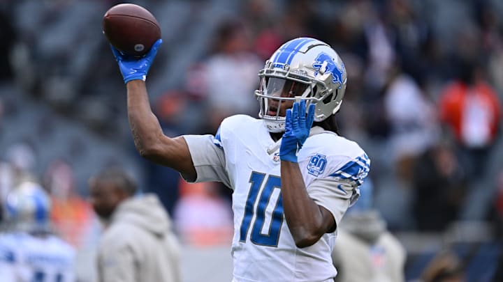 Dec 10, 2023; Chicago, Illinois, USA;  Detroit Lions quarterback Teddy Bridgewater (10) warms up before a game against the Chicago Bears at Soldier Field. Mandatory Credit: Jamie Sabau-Imagn Images