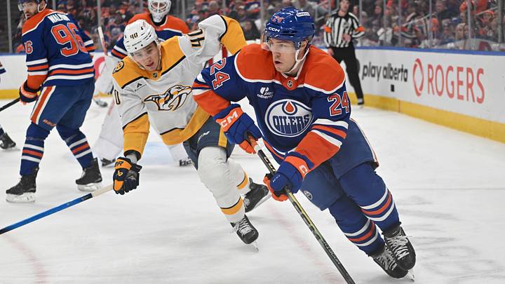 Mar 15, 2026; Edmonton, Alberta, CAN; Edmonton Oilers defenseman Spencer Stastney (24) and Nashville Predators center Fedor Svechkov (40) are seen out on the ice during the second period at Rogers Place. Mandatory Credit: Walter Tychnowicz-Imagn Images