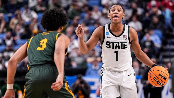 Michigan State guard Jeremy Fears Jr. (1) looks to paws against North Dakota State guard Tay Smith (3) during the second half of NCAA Tournament First Round at KeyBank Center in Buffalo on Thursday, March 19, 2026.