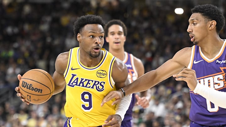 Oct 3, 2025; Palm Desert, California, USA: Los Angeles Lakers guard Bronny James (9) drives past Phoenix Suns forward Ryan Dunn (0) during the first half at Acrisure Arena. Mandatory Credit: Denis Poroy-Imagn Images Oct 3, 2025; Palm Desert, California, USA: Los Angeles Lakers guard Bronny James (9) drives past Phoenix Suns forward Ryan Dunn (0) during the first half at Acrisure Arena. Mandatory Credit: Denis Poroy-Imagn Images
