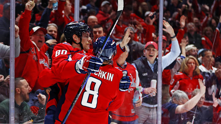 Mar 18, 2025; Washington, District of Columbia, USA; Washington Capitals left wing Pierre-Luc Dubois (80) celebrates with left wing Alex Ovechkin (8) after scoring a goal during the third period at Capital One Arena. Mandatory Credit: Peter Casey-Imagn Images
